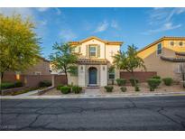 Charming two-story home with a beautifully landscaped front yard and inviting entrance at 11044 Camden Bay St, Las Vegas, NV 89179