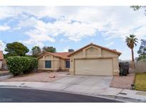 Charming single-story home featuring a two-car garage, well-maintained landscaping and a cozy front entrance at 2916 Drury St, Las Vegas, NV 89108