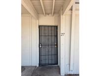 Entry door with security screen and the number 27 to the right at 5390 Swenson St # 27, Las Vegas, NV 89119