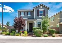 Charming two-story home featuring a manicured front yard and a welcoming entrance in a residential neighborhood at 3531 Montepulciano Ln, Henderson, NV 89044