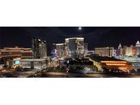 Panoramic night view of the Las Vegas skyline with bright lights and bustling streets at 4525 Dean Martin Dr # 1507, Las Vegas, NV 89103
