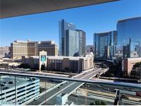 Breathtaking city views of the Las Vegas skyline from a high-rise balcony on a clear day at 4525 Dean Martin Dr # 1507, Las Vegas, NV 89103