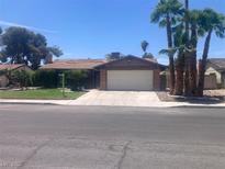 Charming single story home with mature landscaping and a two car garage at 5821 Santa Catalina Ave, Las Vegas, NV 89108