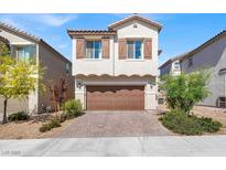 Charming two-story home with a two-car garage and beautiful landscaping at 7107 Tilligerry St, North Las Vegas, NV 89084
