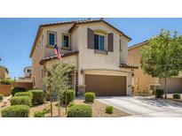 Charming two-story home with a well-manicured lawn, desert landscaping, and a two-car garage at 7761 Sagamore Bay Ct, Las Vegas, NV 89179