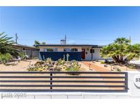 Charming single-story home with a unique xeriscaped front yard and gated entry at 3308 Navajo Way, Las Vegas, NV 89108