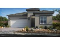 Contemporary home featuring a two-car garage and desert landscaping at 4130 E Brusca Way, Pahrump, NV 89061