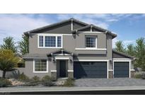 Charming two-story home featuring a two-car garage, well-maintained landscaping, and a welcoming entrance at 7705 Serenity Bay Ln # Lot 57, North Las Vegas, NV 89084