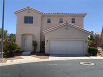 Charming two-story home with a two car garage and desert landscaping in a quiet neighborhood at 10357 Bent Willow Ave, Las Vegas, NV 89129