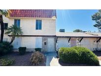 Charming townhome featuring a red tile roof and well-maintained landscaping at 3974 Palos Verdes St, Las Vegas, NV 89119