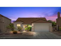 Charming single-story home with desert landscaping and a two-car garage, perfect for low-maintenance living at 538 Ancient Mayan Dr, Henderson, NV 89015