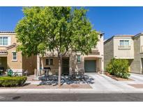 Charming two-story home with a well-maintained front yard and a covered porch at 7645 Interlace St, Las Vegas, NV 89149