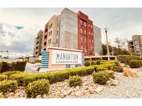 The Manhattan Condominiums feature eye-catching architecture, gorgeous landscaping, and a desirable location at 62 E Serene Ave # 115, Las Vegas, NV 89123