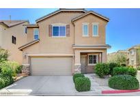 Charming two-story home features a two-car garage and well-manicured landscaping in a desirable neighborhood at 7963 Cape Brett St, Las Vegas, NV 89131