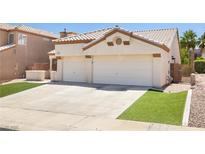 Charming single-story home featuring a two-car garage and well-maintained landscaping at 1515 Horizon Crest Ct, Henderson, NV 89012