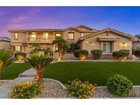 Stunning home with well-maintained lawn and landscaping at 7001 Via Locanda Ave, Las Vegas, NV 89131