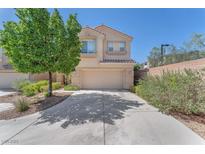 Charming two-story home with a two-car garage and well-maintained landscaping at 6247 Sugartree Ave, Las Vegas, NV 89141