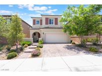 Charming two-story home with a well-maintained front yard and inviting curb appeal at 10829 Crestview Pointe Ave, Las Vegas, NV 89166
