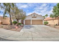 Charming single-story home featuring a two-car garage and desert landscaping in a tranquil neighborhood at 4176 Demoline Cir, Las Vegas, NV 89141