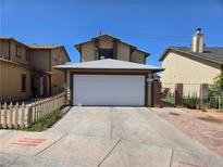 Charming two-story home featuring a two-car garage and a well-maintained front yard at 4612 Supreme Ct, Las Vegas, NV 89110