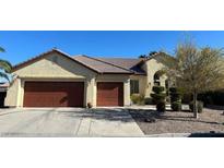 Charming single-story home with a two-car garage and manicured landscaping, ideal for comfortable living at 5016 Wayfaring Tree Ave, Las Vegas, NV 89131