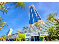Palms Place hotel and condo residences with palm trees and bright blue sky, a luxury experience at 4381 W Flamingo Rd # 901, Las Vegas, NV 89103