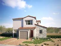 Charming two-story home with a mix of stucco and stone, complemented by desert landscaping and a brick driveway at 1808 Mangrove Ct, Las Vegas, NV 89138