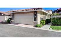 Charming home with a two-car garage and low-maintenance landscaping at 3013 Plaza De Rosa, Las Vegas, NV 89102