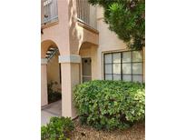 Charming condo featuring well-maintained landscaping near the entrance, enhancing its curb appeal at 4805 S Torrey Pines Dr # 101, Las Vegas, NV 89103
