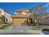 Charming two-story home featuring a two-car garage and a well-maintained front yard in a sunny neighborhood at 3412 Adventure Ct, Las Vegas, NV 89129
