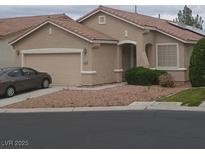 Charming single-story home with a well-maintained front yard and a two-car garage at 3416 Mountain Park St, Las Vegas, NV 89129