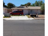 Modest single story home featuring a quaint front yard and ample parking at 4931 Nevada Ave, Las Vegas, NV 89104