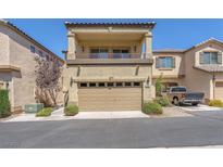 Charming two-story home featuring an attached two-car garage and a cozy second-story balcony at 7852 Running Doe Ct, Las Vegas, NV 89149