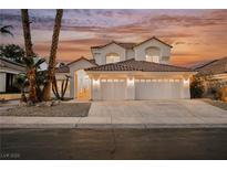 Stunning two-story home with a three-car garage and well-maintained landscaping at 8104 Bay Harbor Dr, Las Vegas, NV 89128