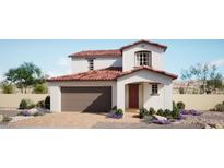 Charming two-story home features a terracotta roof, neutral stucco, and an attached two car garage at 634 Poplar Pine St, Henderson, NV 89011