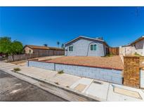 Charming single-story home with a well-maintained front yard and a classic exterior design at 2432 Spanish Ct, Las Vegas, NV 89108