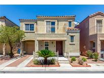 Charming two-story home with a front patio and a balcony on the second floor at 6308 Anticline Ave, Las Vegas, NV 89139