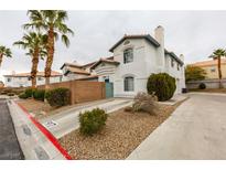 Charming townhome with desert landscaping, spacious driveway, and a private front courtyard at , Las Vegas, NV 89145
