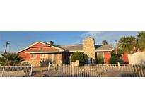 Cozy single-story home with stone accents and a well-maintained front yard at 812 Pyramid Dr, Las Vegas, NV 89107