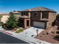 Charming two-story home with a two car garage, desert landscaping, and covered entry way at 10373 Northern Hills Ave, Las Vegas, NV 89166