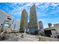 View of modern high-rise buildings in the city with a vibrant sky, showcasing luxury and location at 3726 Las Vegas Blvd # 1809, Las Vegas, NV 89158