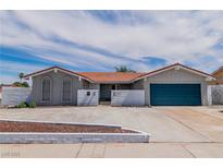 Charming single-story home featuring a well-maintained front yard and a two-car garage at 4813 Plata Del Sol, Las Vegas, NV 89121