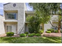 Charming condo with stucco facade, balcony, and well-maintained landscaping at 6250 W Flamingo Rd # 43, Las Vegas, NV 89103