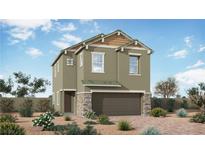 Charming two-story home featuring a two-car garage and stone accents, set against a blue sky at 407 Grand Toccata St, Henderson, NV 89011