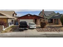 Cozy single-story home featuring a two-car garage and low maintenance landscaping at 653 Lineshack Ln, Las Vegas, NV 89110
