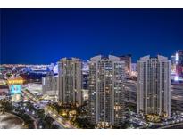 Striking night view showcasing illuminated high-rise buildings along the Las Vegas Strip skyline at 222 Karen Ave # 2308, Las Vegas, NV 89109