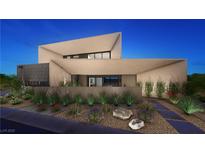 Striking contemporary home with clean lines, desert landscaping and a welcoming entrance at 2655 Juniper Branch St, Las Vegas, NV 89117