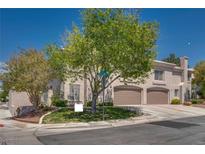 Spacious two-story home featuring a two-car garage and mature landscaping at 500 Quail Bird Pl, Henderson, NV 89052
