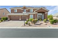 Charming two-story home featuring a three-car garage, beautiful landscaping, and a welcoming entrance at 6013 Jubilee Gardens Ave, Las Vegas, NV 89131