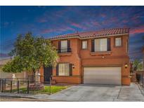 Charming two-story home featuring a well-manicured front yard and a two-car garage in a desirable neighborhood at 7959 Palace Monaco Ave, Las Vegas, NV 89117